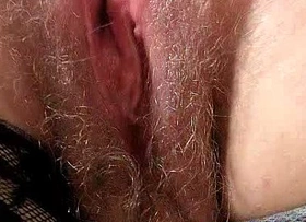 Redhead huge boobies cougar spreads her haired piss hole