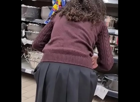 Spying teen girl at supermarket - short skirt